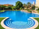 Luxury Outdoor Swimming Pool with Curved Blue-Tiled Steps