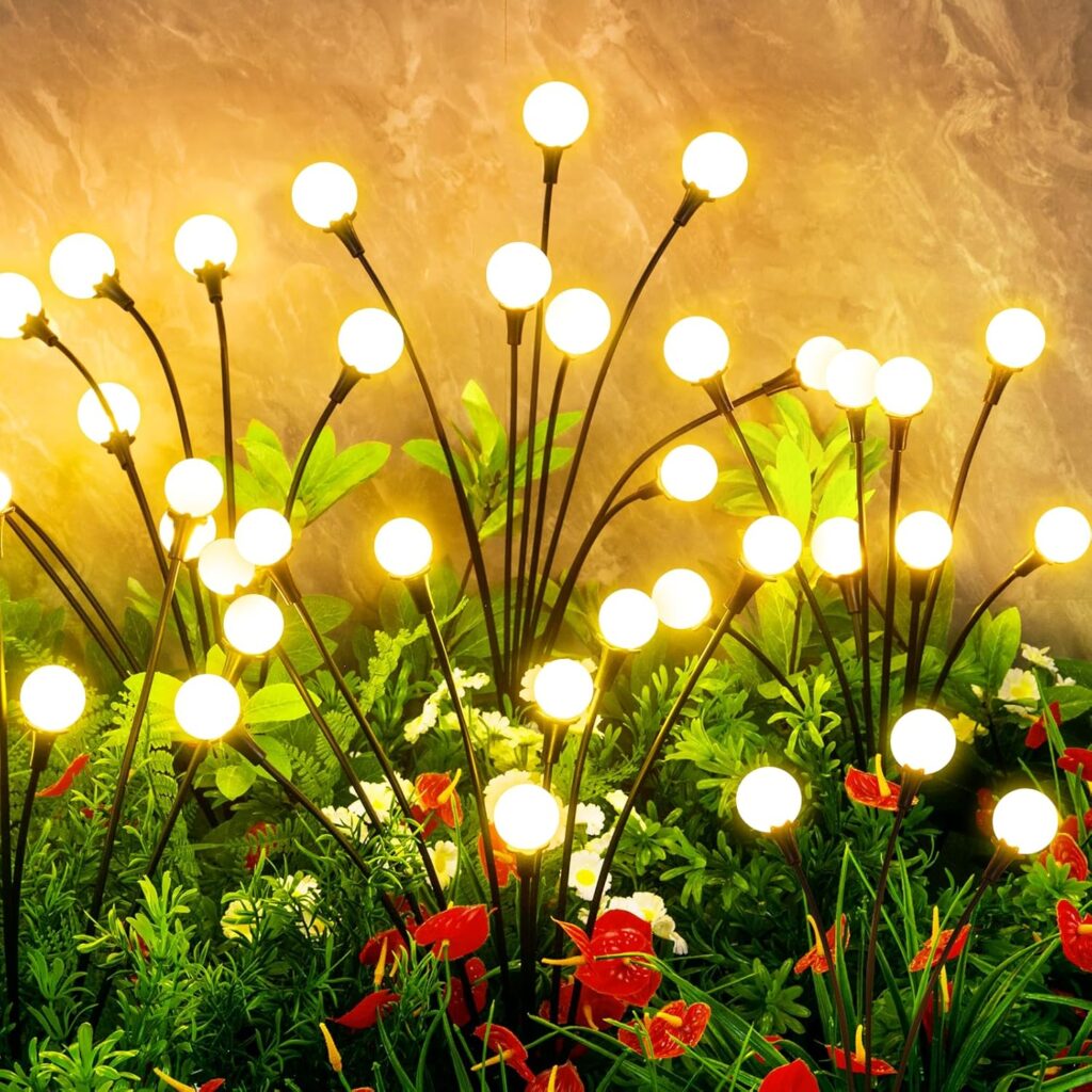 vignuto solar firefly lights hanging in garden at night